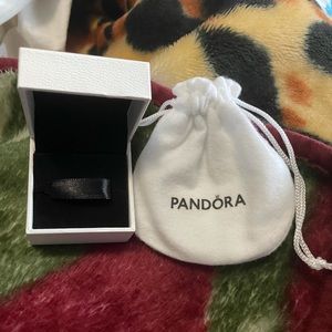 Empty Pandora charm box and cloth bag